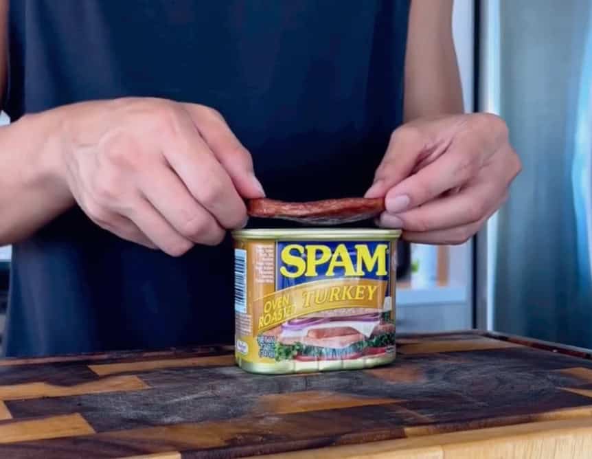 step 6 spam musubi add spam to container